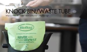 What is a Knock Bin/Waste Tube in professional coffee brewing?